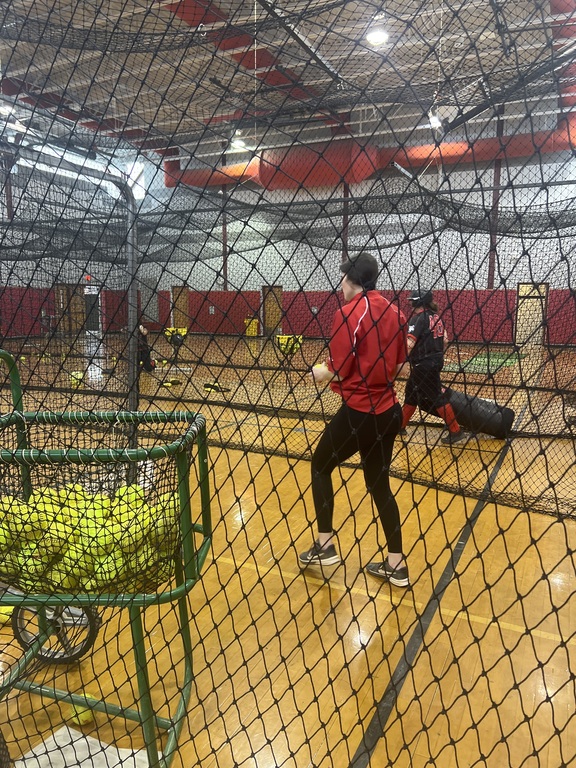 Coach Throwing some Bp