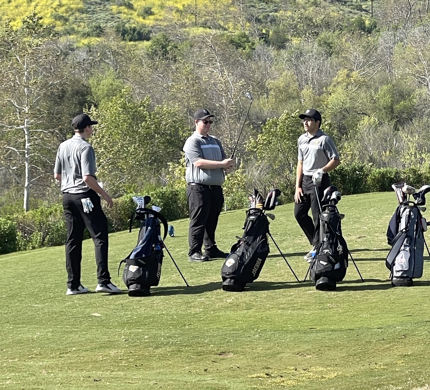 Colton,Austin, and Michael discuss their next shot.