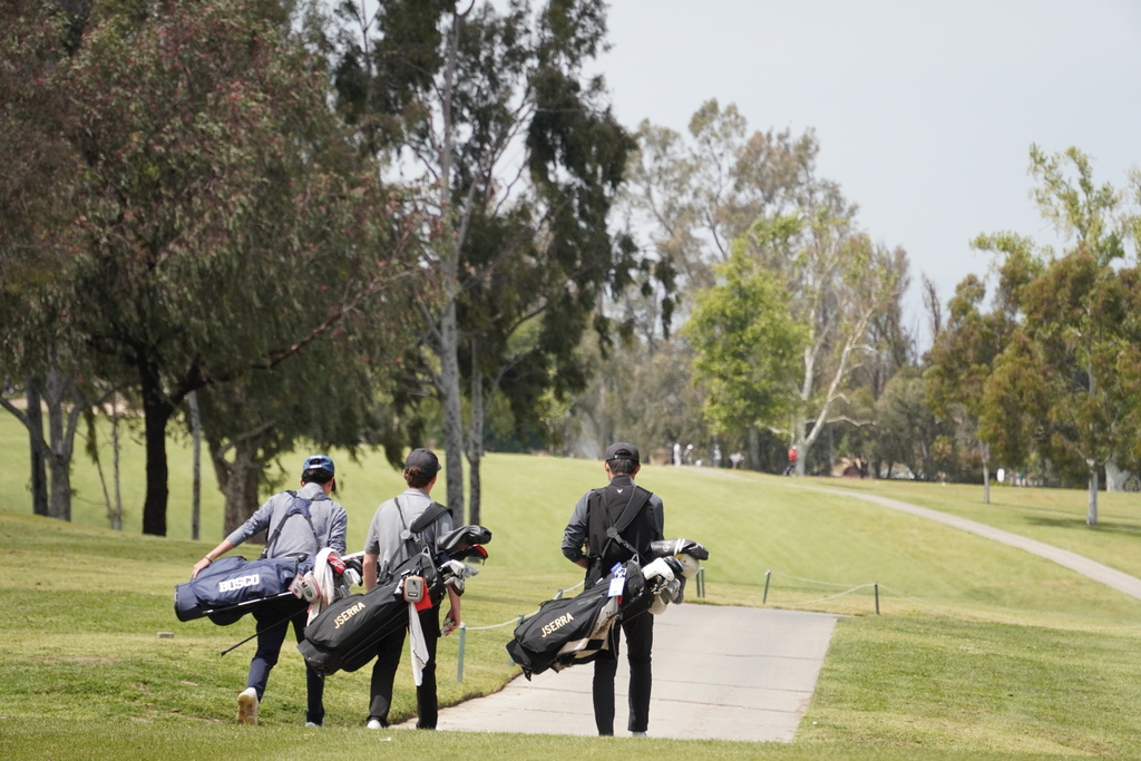 Liam and Harley off to hit their approach shot.