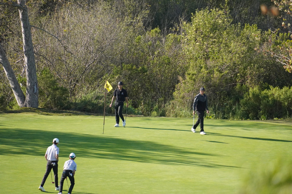 Harley and Zach on the putting green.