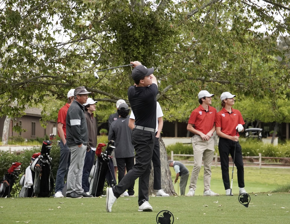 Liam on the first tee with his opening round tee shot.