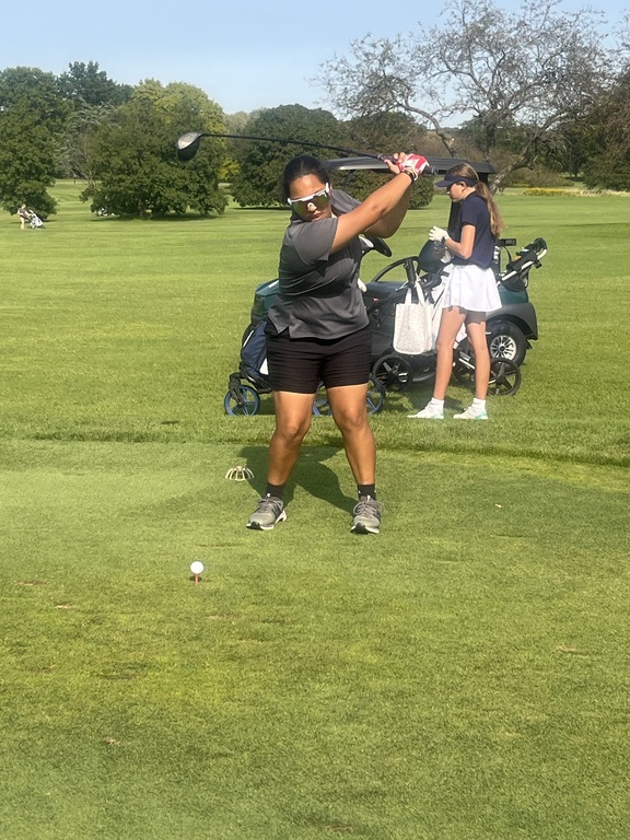 Vivianna Hernandez hits her tee shot on hole 1