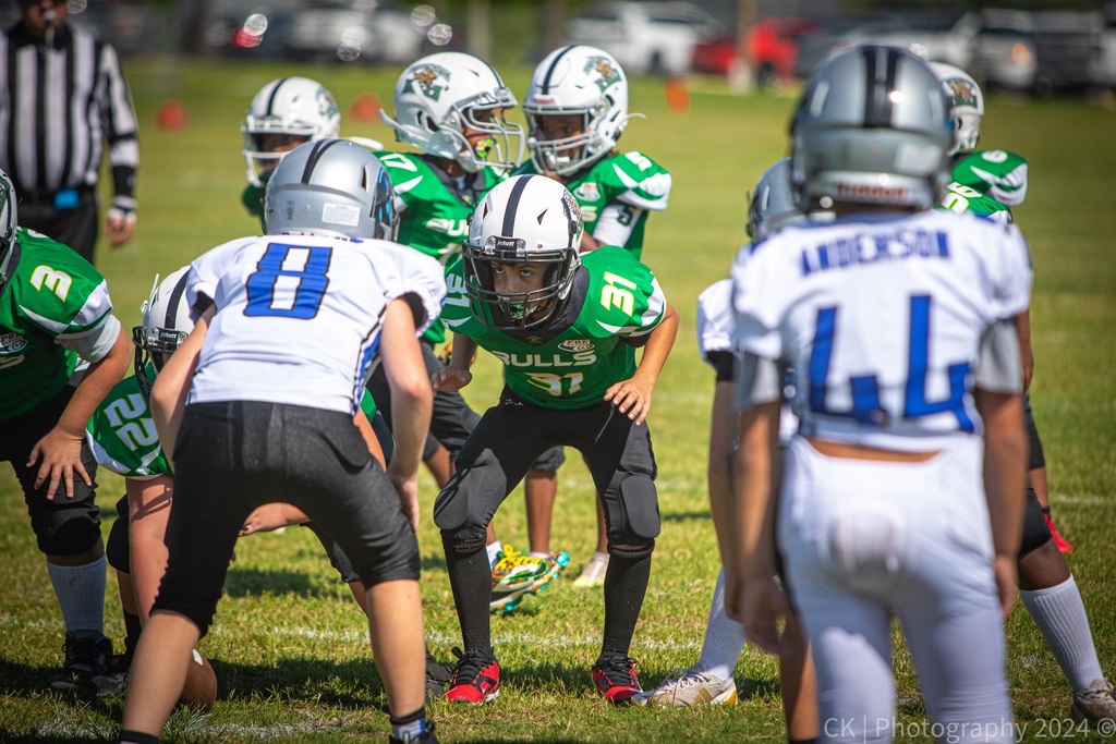 A hungry #31 intimidates the Panthers #8 on the line for the Photo-of-the-Game!! #gobulls #hornsup