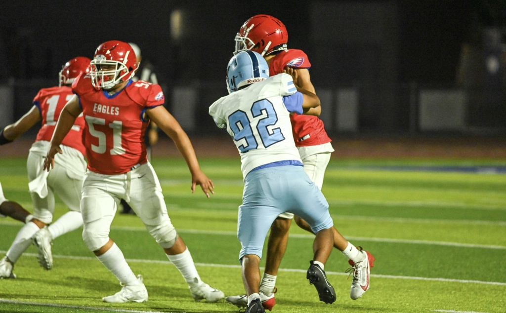 #92 Julian Centeno attacks for the Trojans