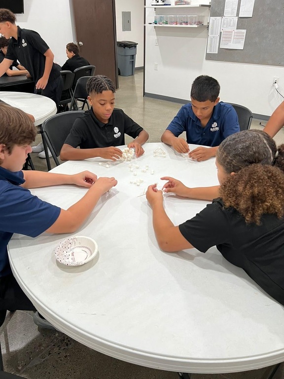 On September 13, our Squad Games was a challenge to build the tallest marshmallow-toothpick structure. Each group was given the same number of marshmallows and toothpicks and the same amount of time. Here's a glimpse of the process for Texas A&M Aggies.