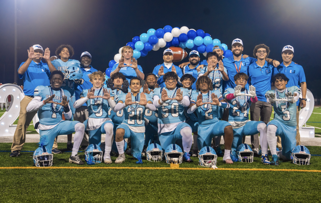 Senior Night as 12 senior players gathered with coaches to get a photo in the last home game.