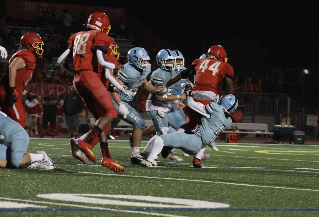 #1 Justin Tribble makes 1 of his 3 tackles on the night.