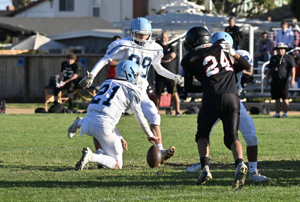 #89 Trevor Pattock gets the kick for the Trojans in their 17-12 victory.  For more great photos visit: https://unifootballboosters.smugmug.com/2024-2025/BOYS-FROSH