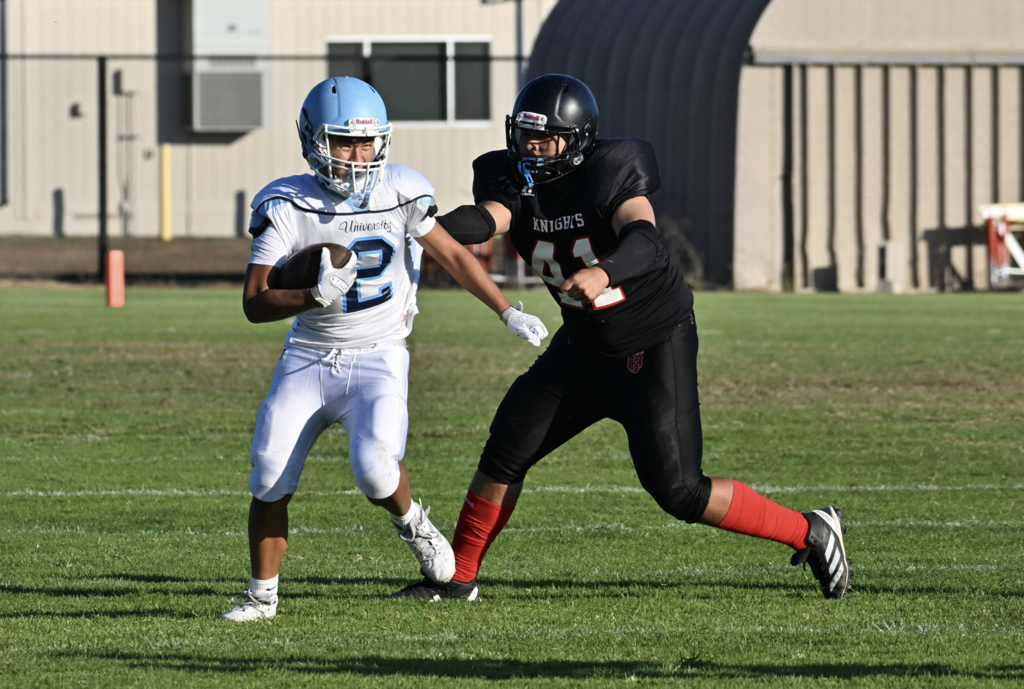 #2 Alex Hsu escapes the Katella defender for the Trojans in the victory.  For more great photos visit: https://unifootballboosters.smugmug.com/2024-2025/BOYS-FROSH