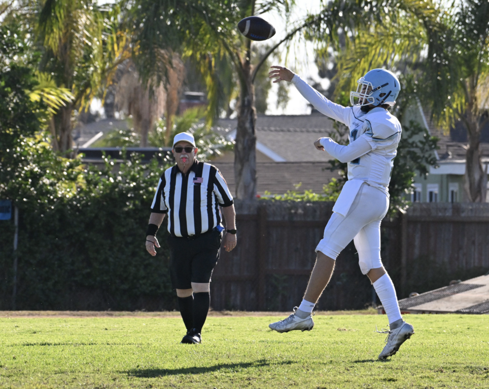 #11 Charlie Carmichael gets off a pass for the Frosh Trojans. 
 For more great photos visit: https://unifootballboosters.smugmug.com/2024-2025/BOYS-FROSH