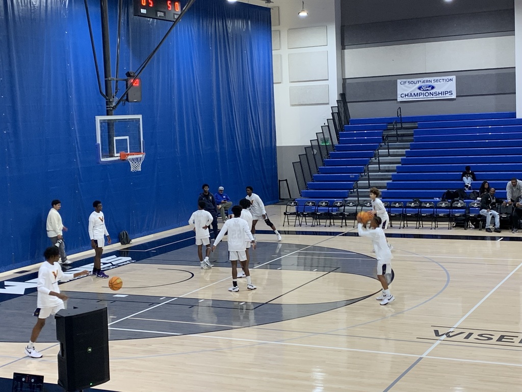 Warm up for game 1 of the Wiseburn Tournament, Manual Arts.