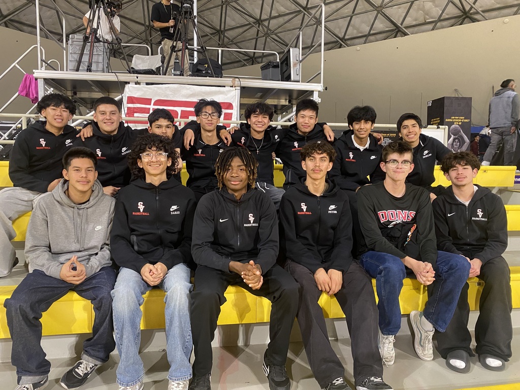 Boys taking in the Long Beach State Game