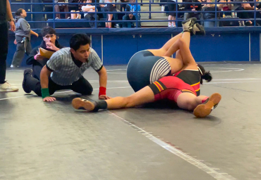 Liz pins her way to a 2-0 record to start