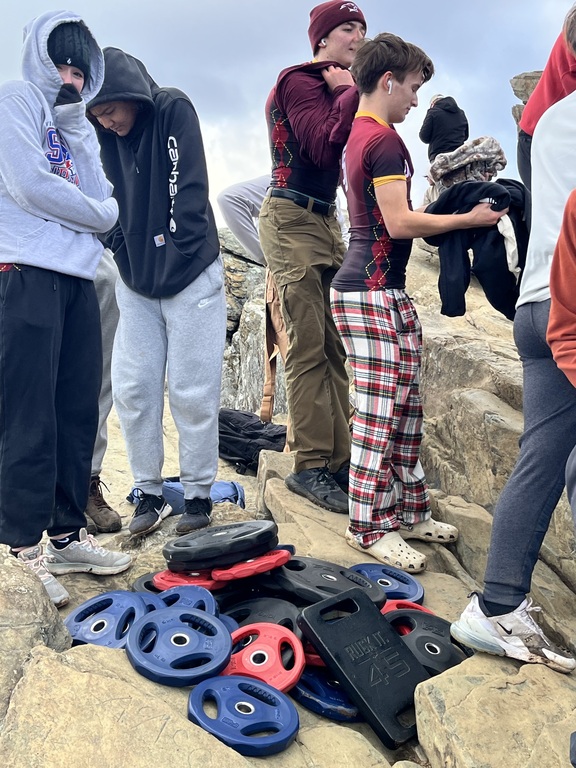 The 383 lbs of weights the team carried to the top