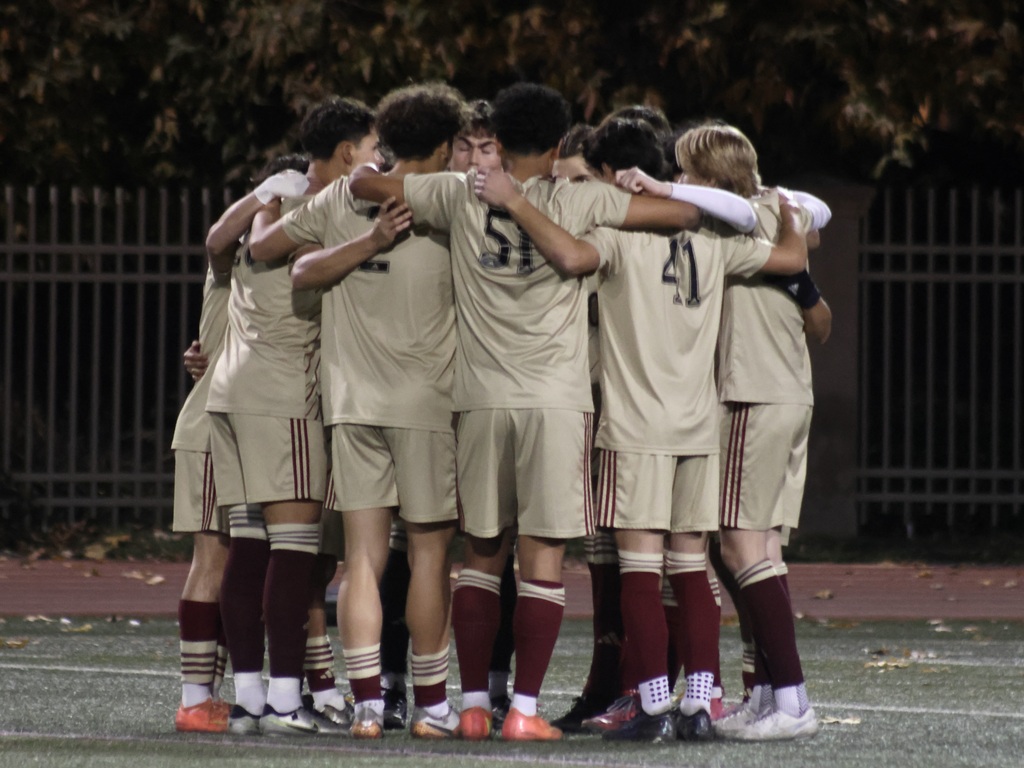 Pre Match Huddle with starting squad