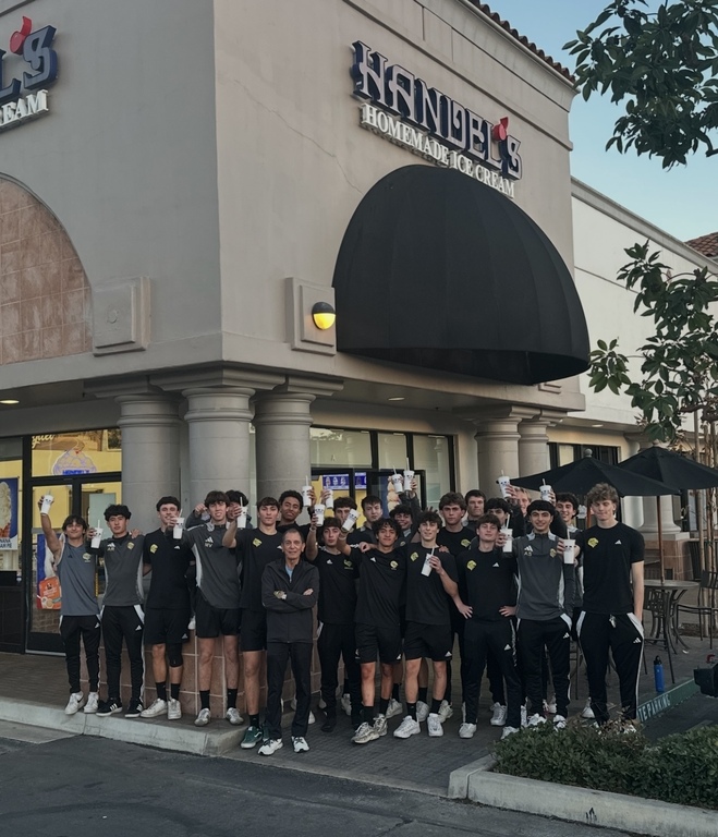 Coach Madrid treating the varsity team to milkshakes at Handel’s Homemade Ice Cream