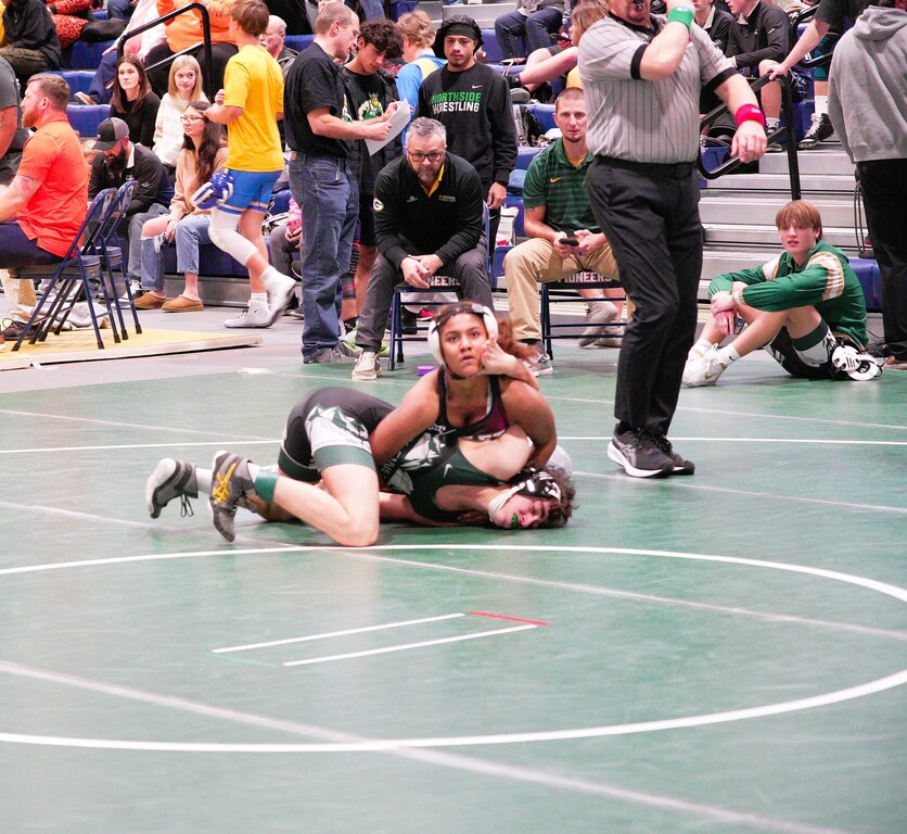 Saryah on her way to scoring a takedown