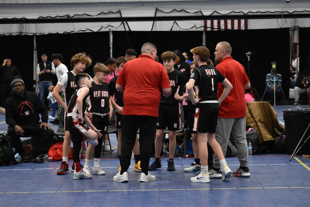 Coach Rob and Coach John coaching the Made Hoops Circuit - 6th grade Gold Team (Winter 2024-2025)