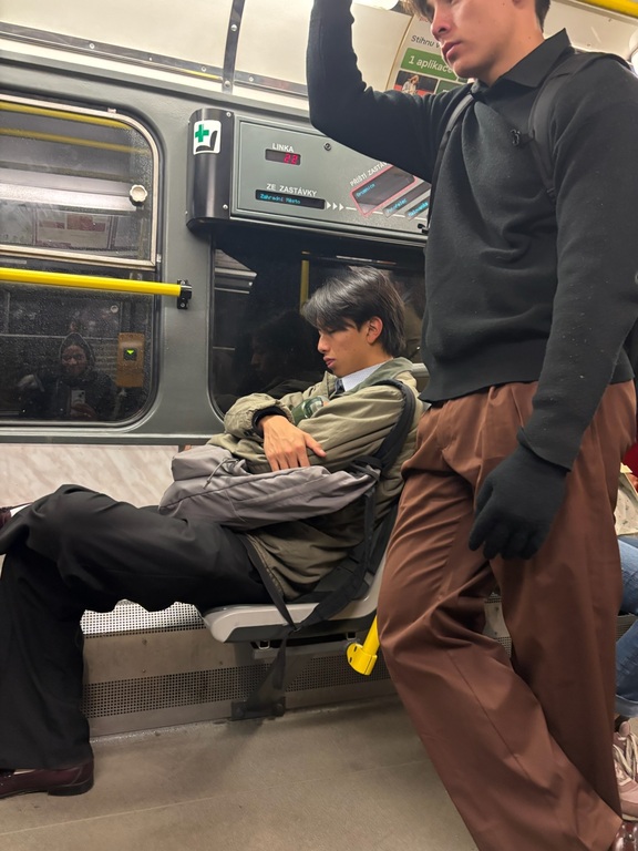 Dylan Minesaki sleeping in train