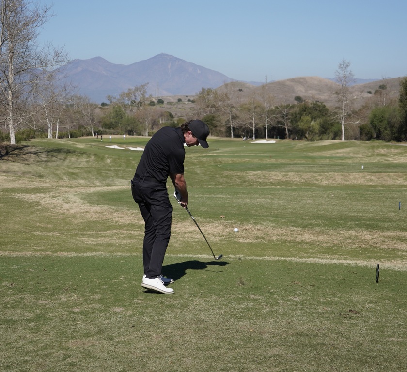 Adam Rubin with his tee shot on hole one.