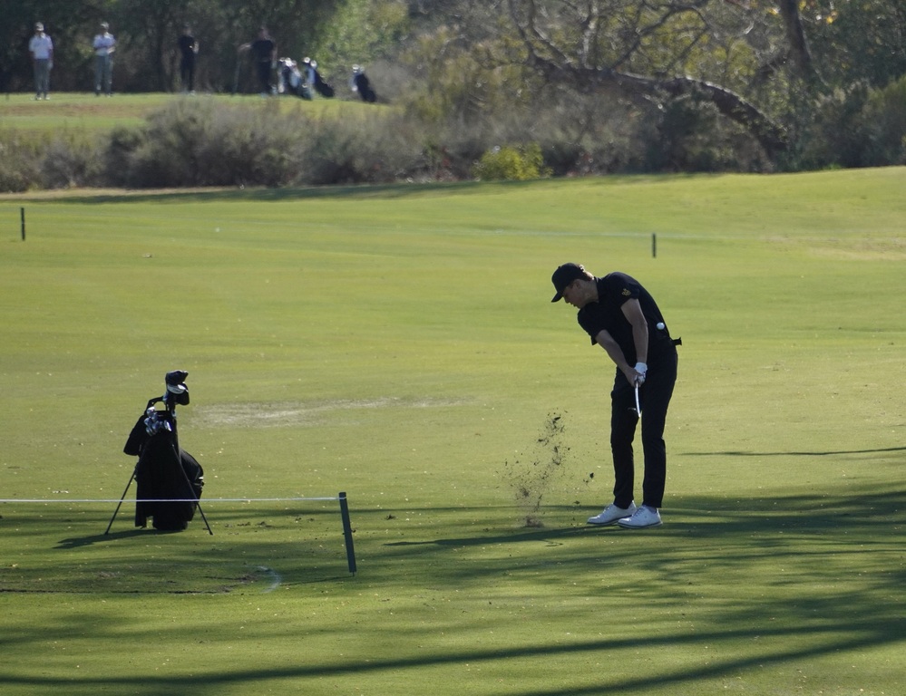 Finn with his approach shot on hole 2. Finn was able to make birdie on this hole after his successful approach shot and single putt.