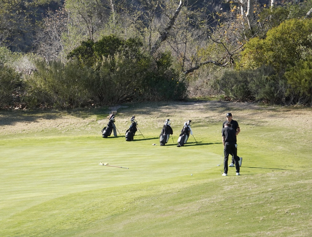 Adam Rusin on the green of hole 2.  Adam made a 12 foot putt for birdie.