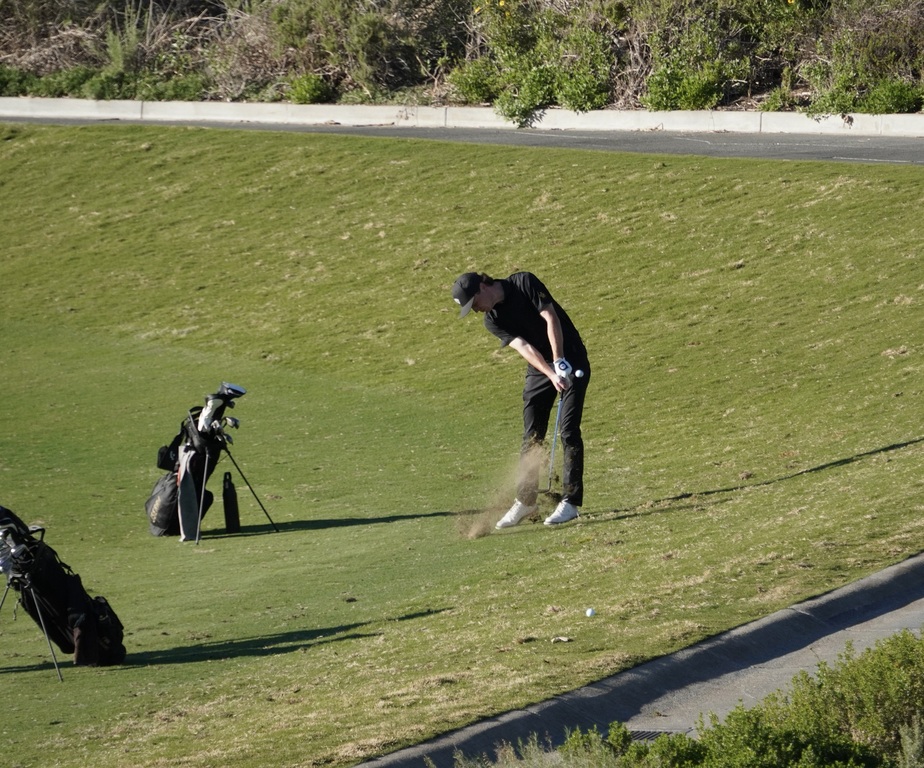 Adam Rusin with his approach shot into the green of hole 6.