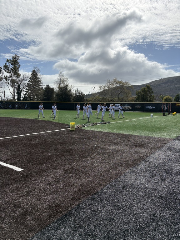 Varsity warming up for our Home Opener today at 3:30 vs. Dana Hills 🦁