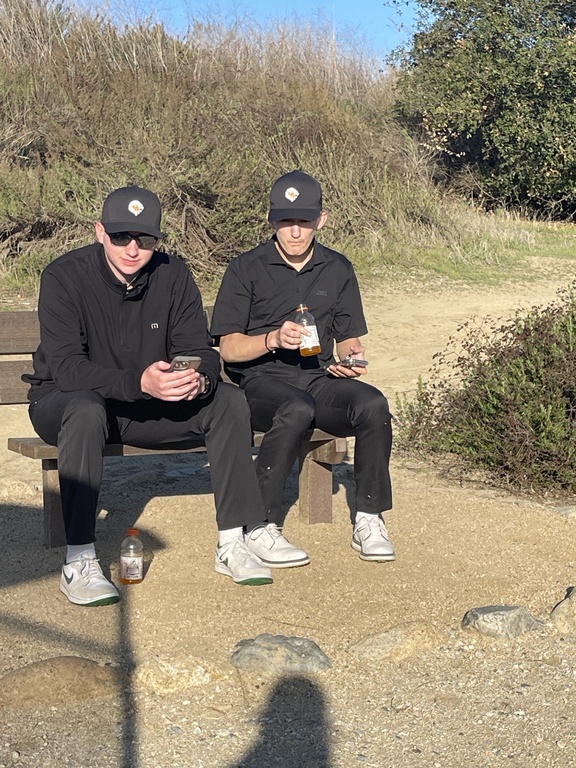 Colton and paul relaxing after a great round of golf