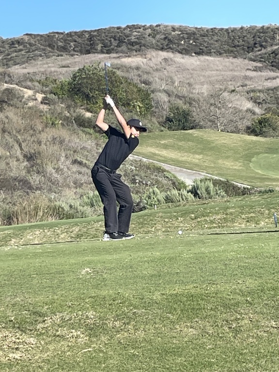 Kaikoa Tee's off on hole 6.