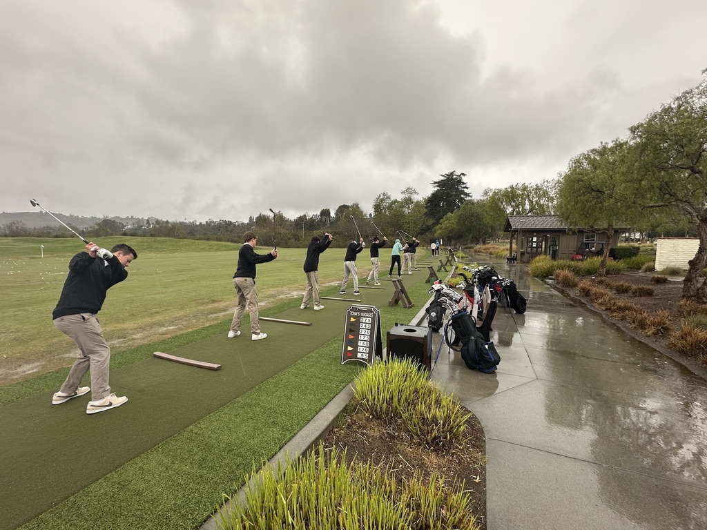 JV Crimson, grinding through a practice in the rain to get ready for their first match next week.