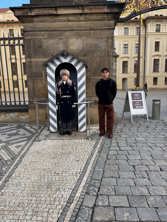 Me standing next to a royal guard and learning it’s history in prague