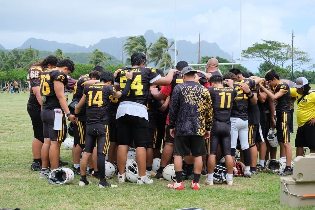 14u prayer after 1st game against 44 rebels
