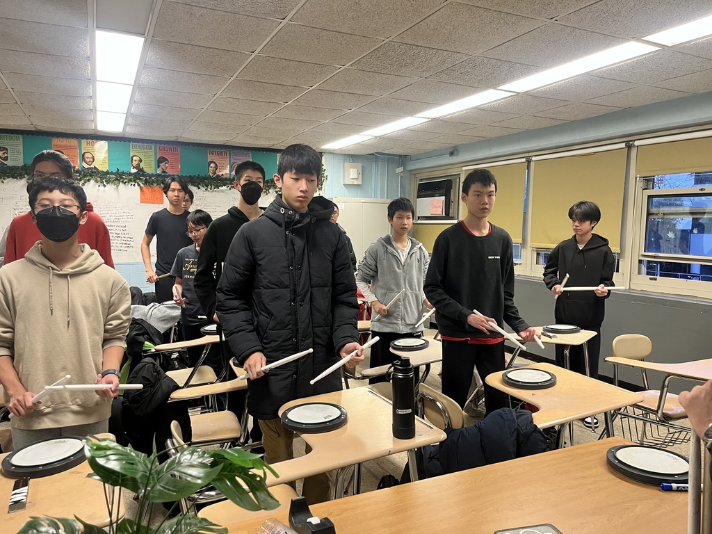 Drum Corps new members learning “Wow Dumpy” beat— created by the old members!
