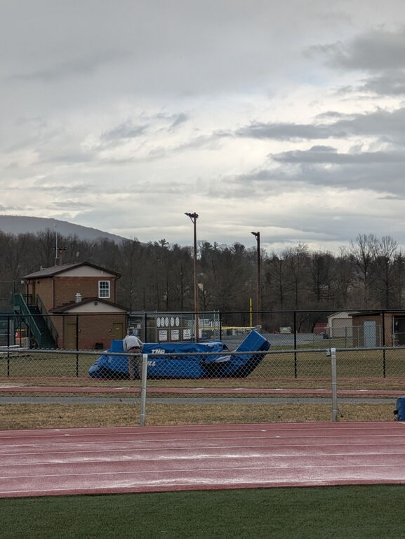 Mother Nature seems to not like our jumping pits in their current place.  She thought they'd look better at the Long and Triple Jump Pits!  😕