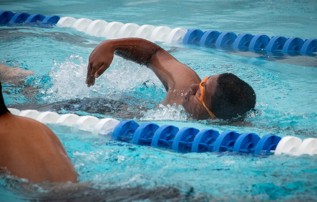 Siam Karim warming up before the intersquad meet
