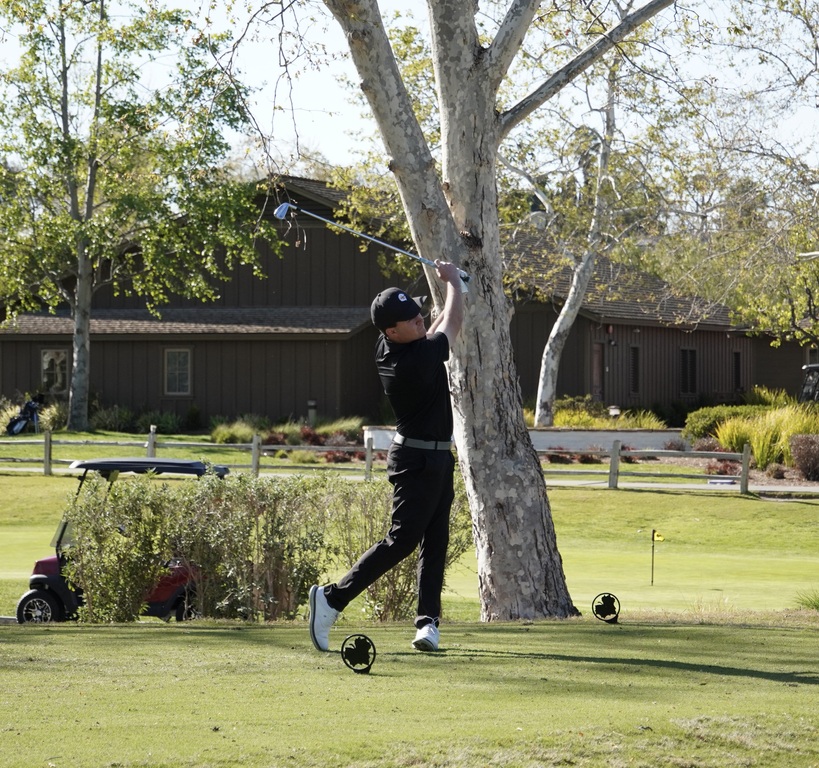 Liam with his opening round tee shot.