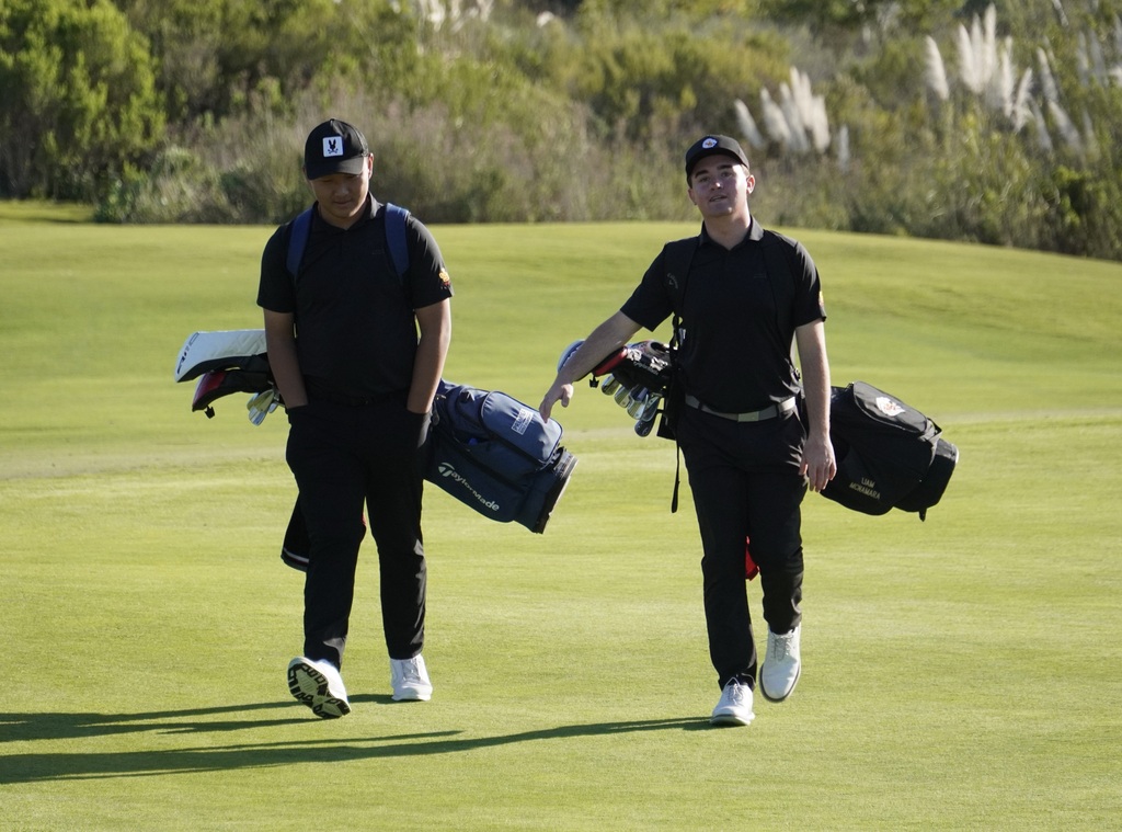 Lucas and Liam walking to their next shot.