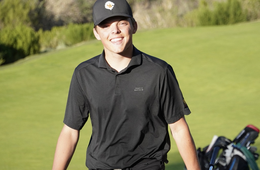 Finn is all smiles during his successful round of golf.