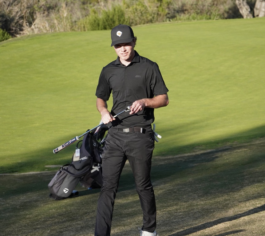Adam coming off the green of hole 6.