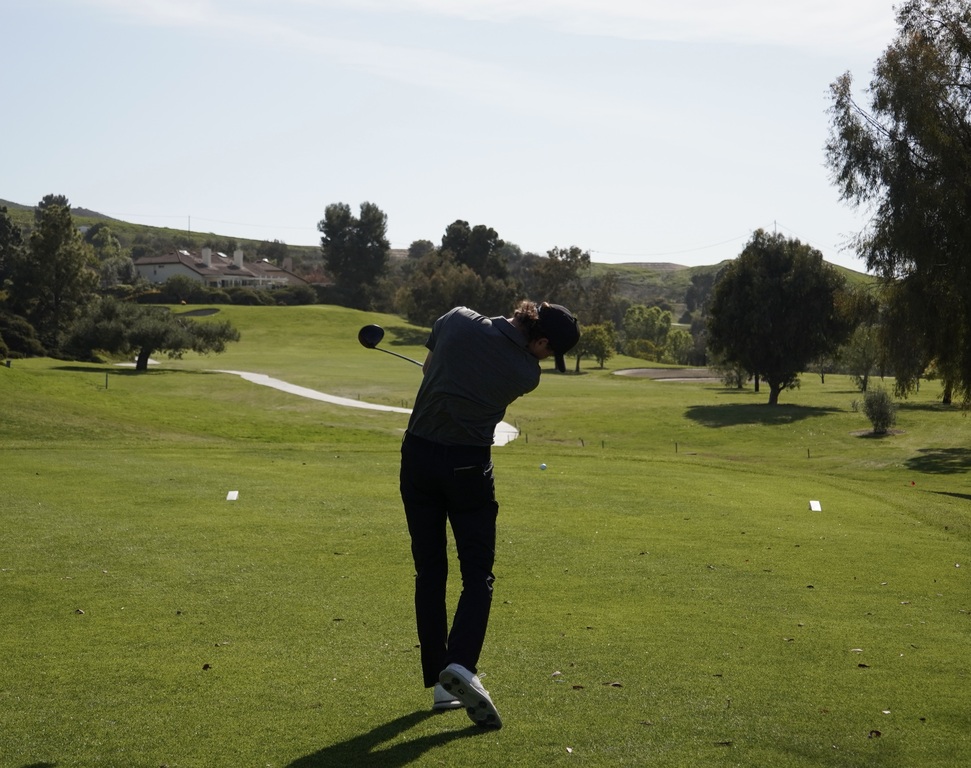 Adam Rusin with his tee shot on hole 2.
