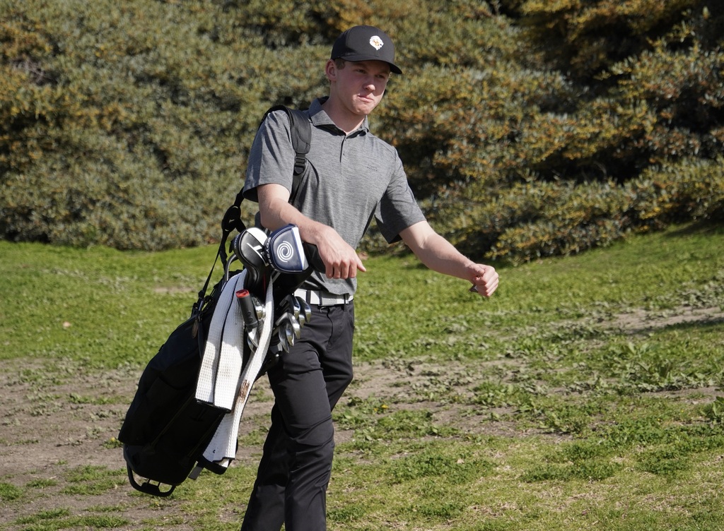 Gavin Heller making his way to the tee box of hole 2.
