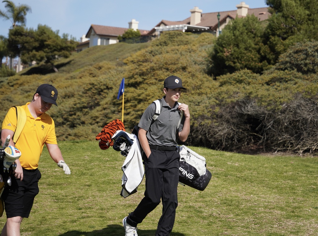 Jase coming off the green of hole 1 and making his way to the tee box of hole 2.