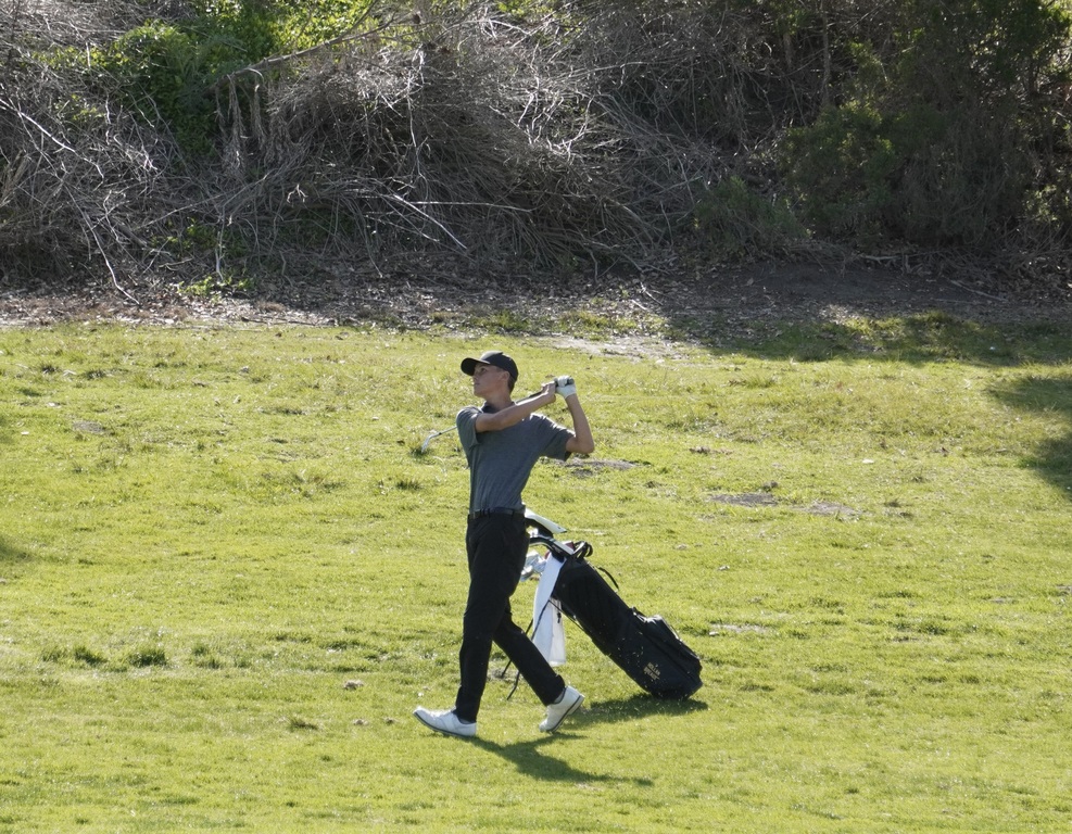 Hollan with his approach shot into the 4th hole green.