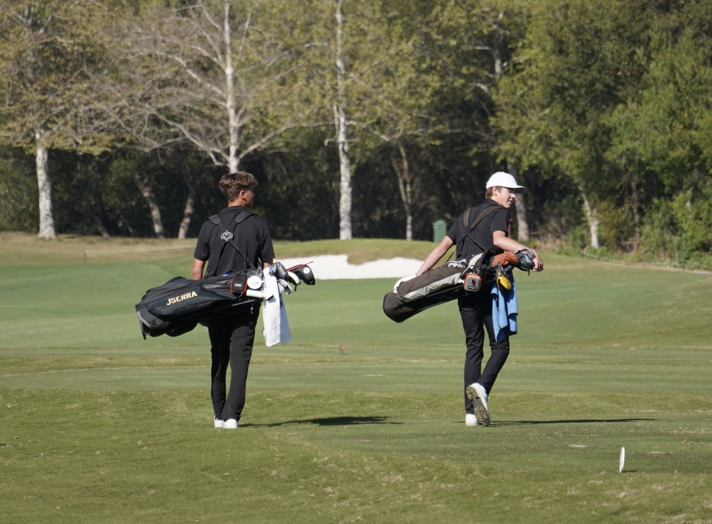 Hollan and Gianni on hole 1.
