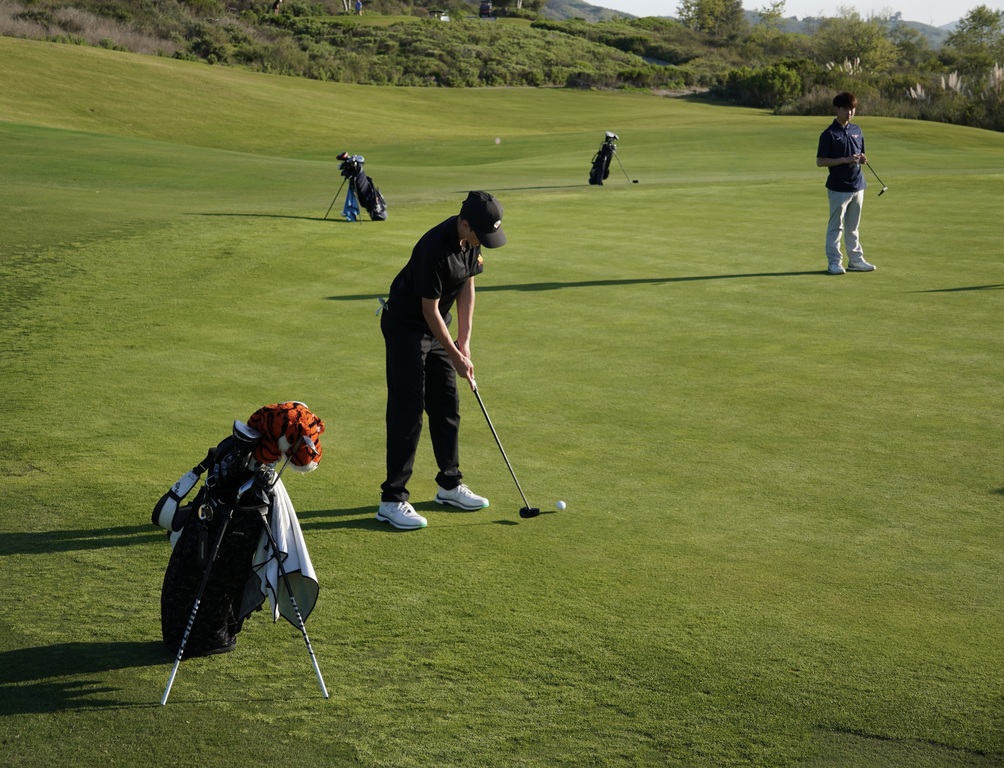 Jase on the putting green of hole 4.