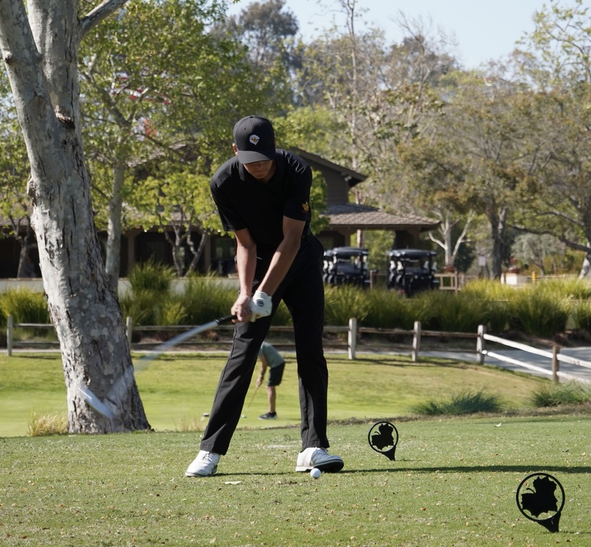 Next on the tee, Hollan with his opening round tee shot.