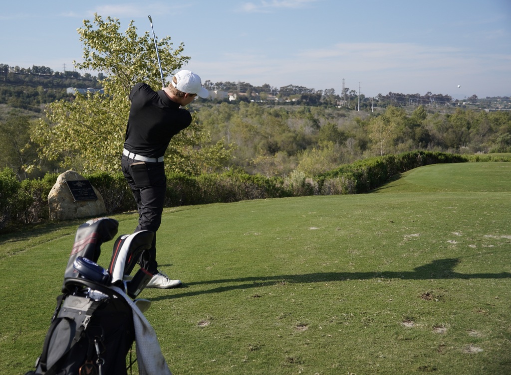 Gavin Heller teeing off on hole 4.