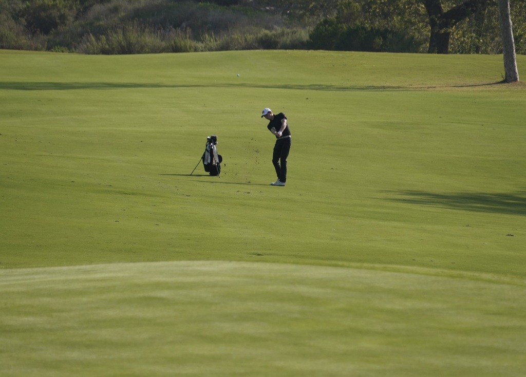 Gavin Heller's approach shot into the green of hole 5.