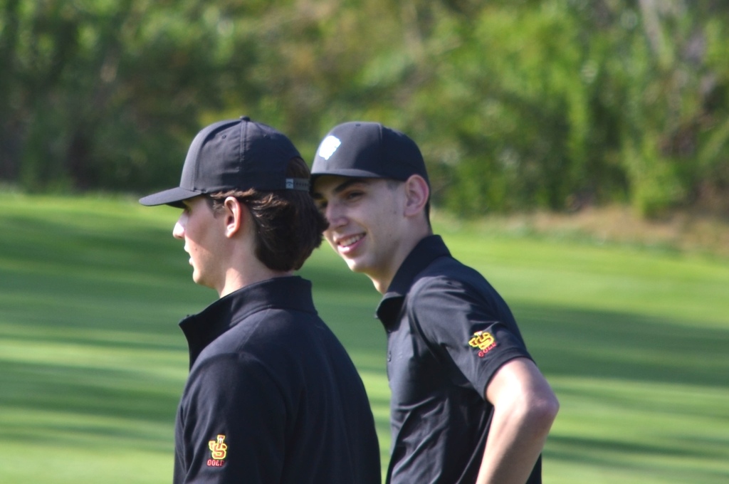 Ryan and Grayson discussing their next shot.